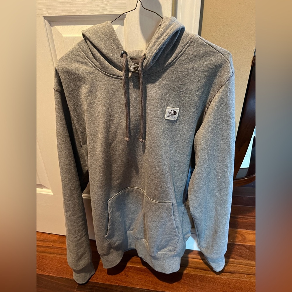 The North Face Men’s Box logo fleece hoodie, size Medium in Grey.